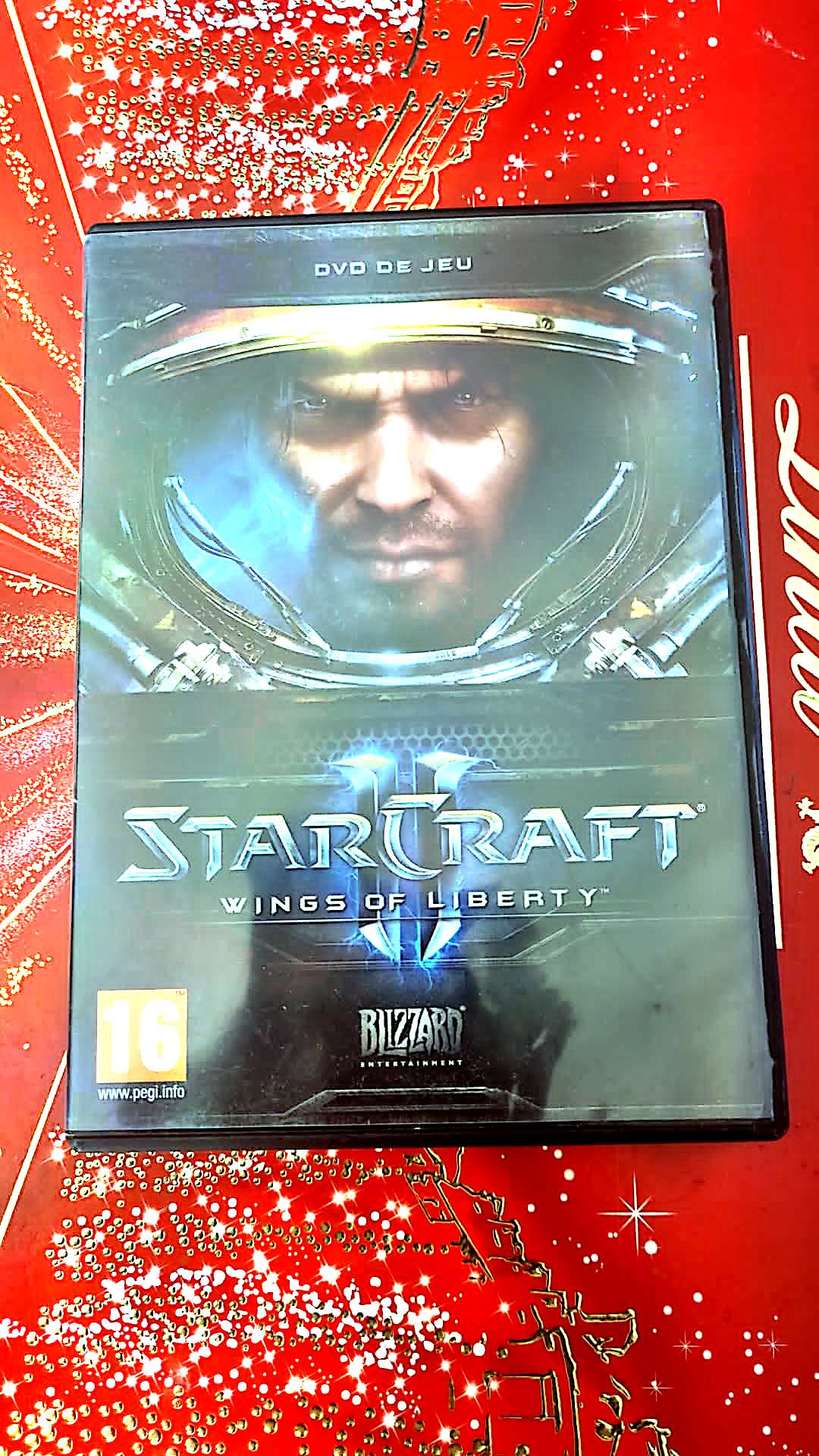 dvd de jeu star craft II wings of liberty vendu en bon etat par blaspo