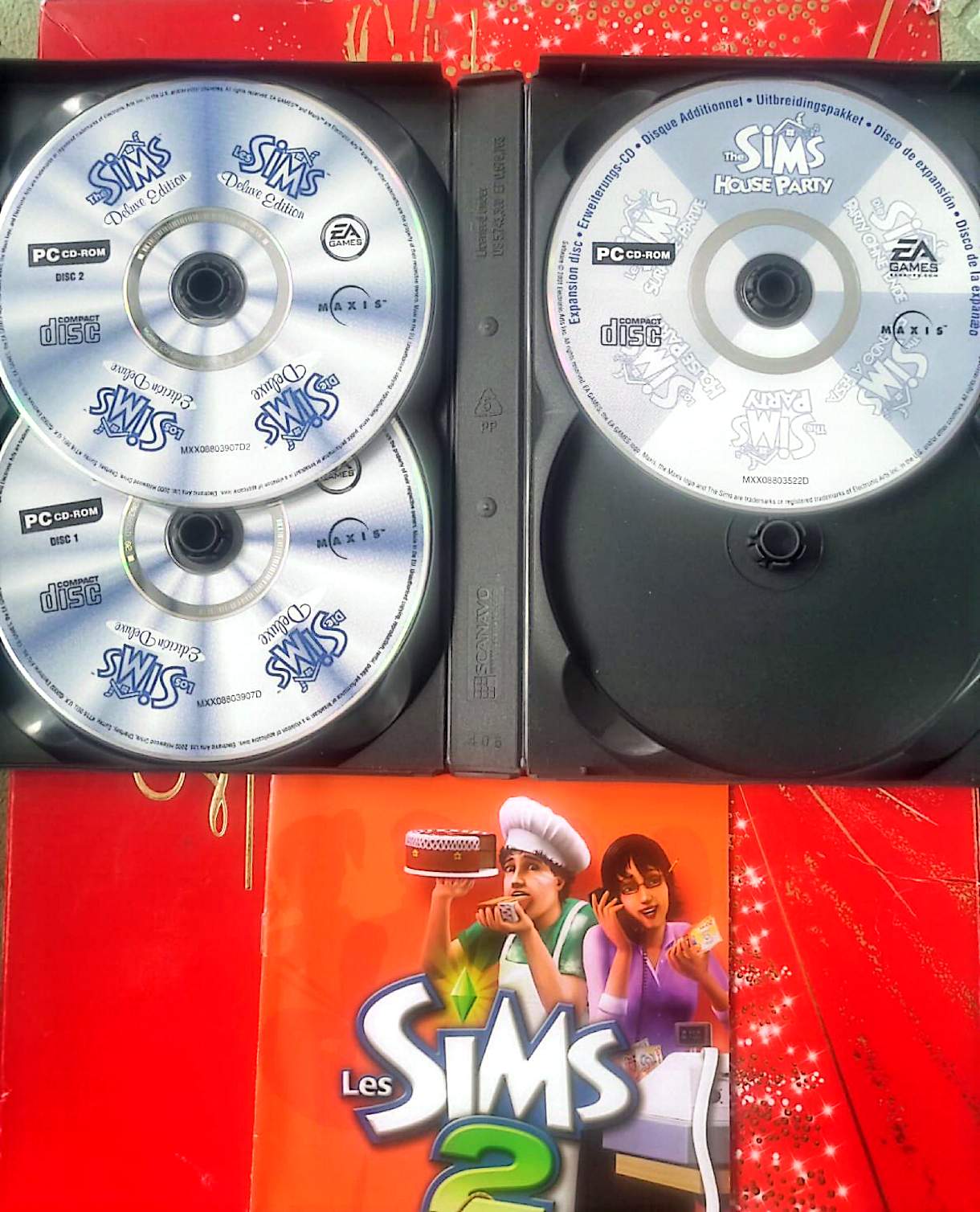 Les Sims Double Deluxe – Jeu PC – Boîte + livret – 3 CD (contenu incomplet