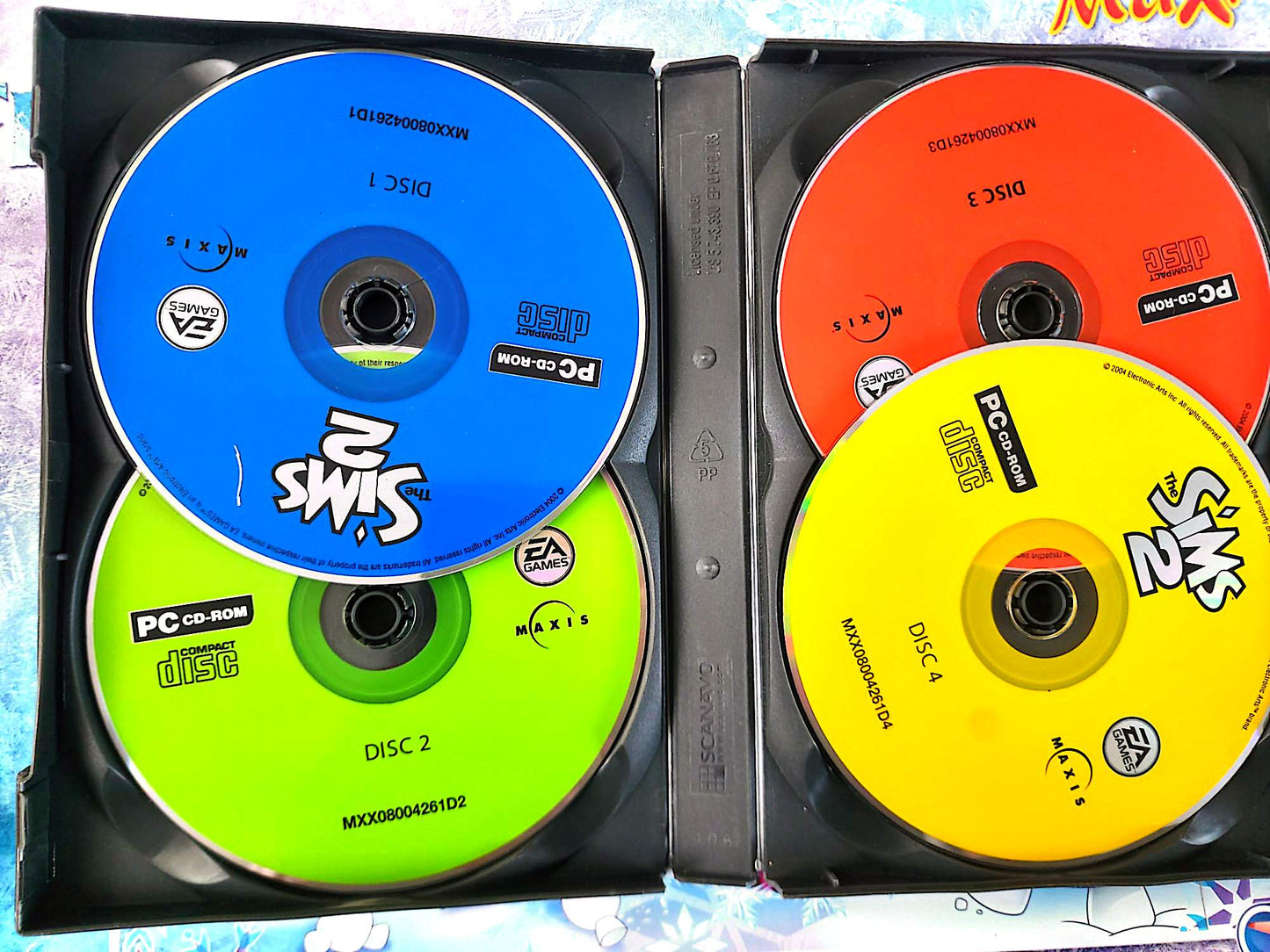 Les Sims 2 Jeu PC CD-ROM Complet 4 Disques Clé d’Installation Déjà Utilisée Simulation de Vie EA Games