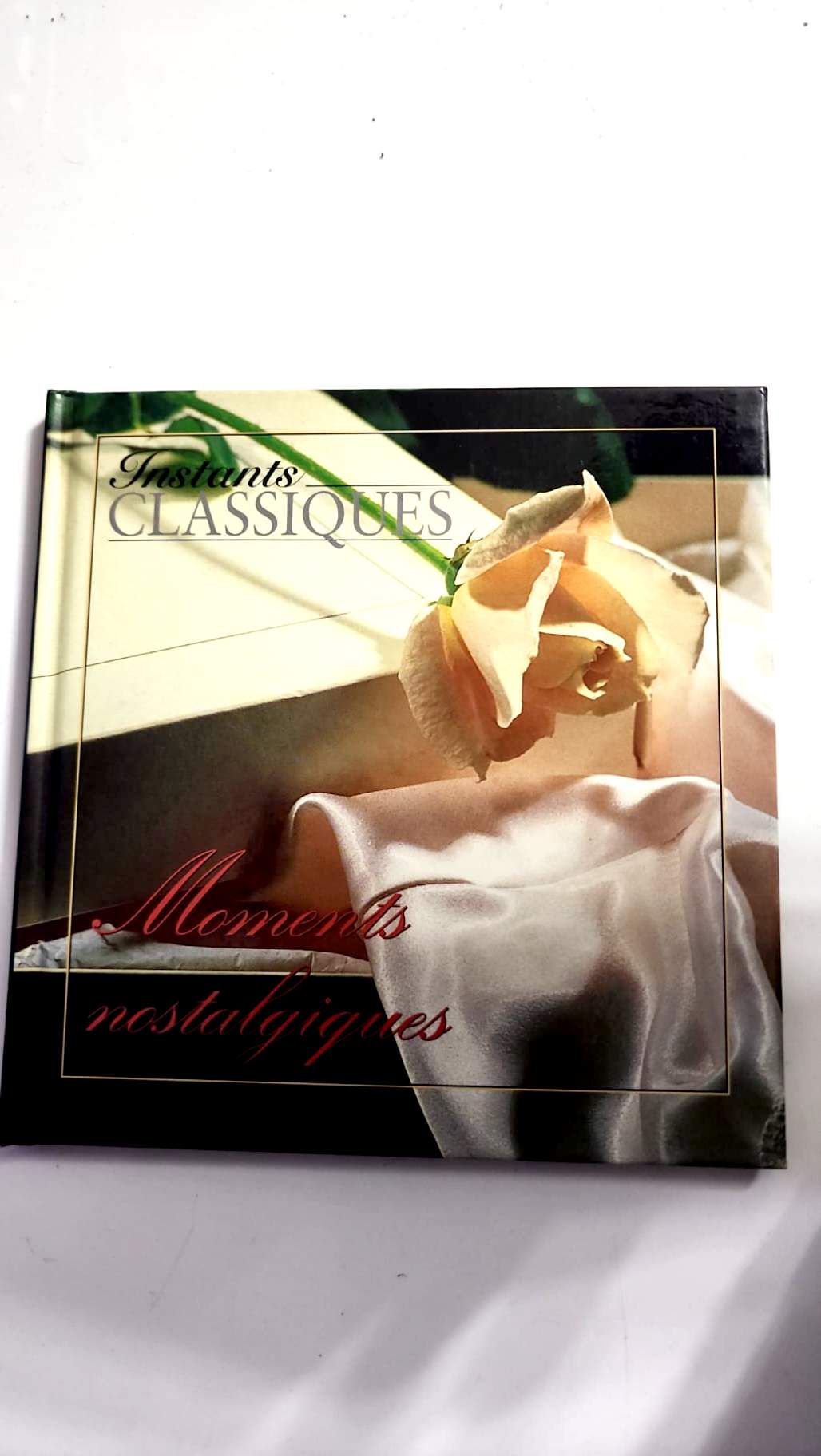 Livre ouvert avec CD audio et livret d’écoute Moments nostalgiques