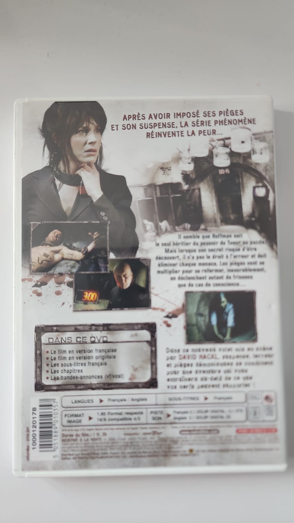 Jaquette arrière du DVD Saw avec détails et code-barres