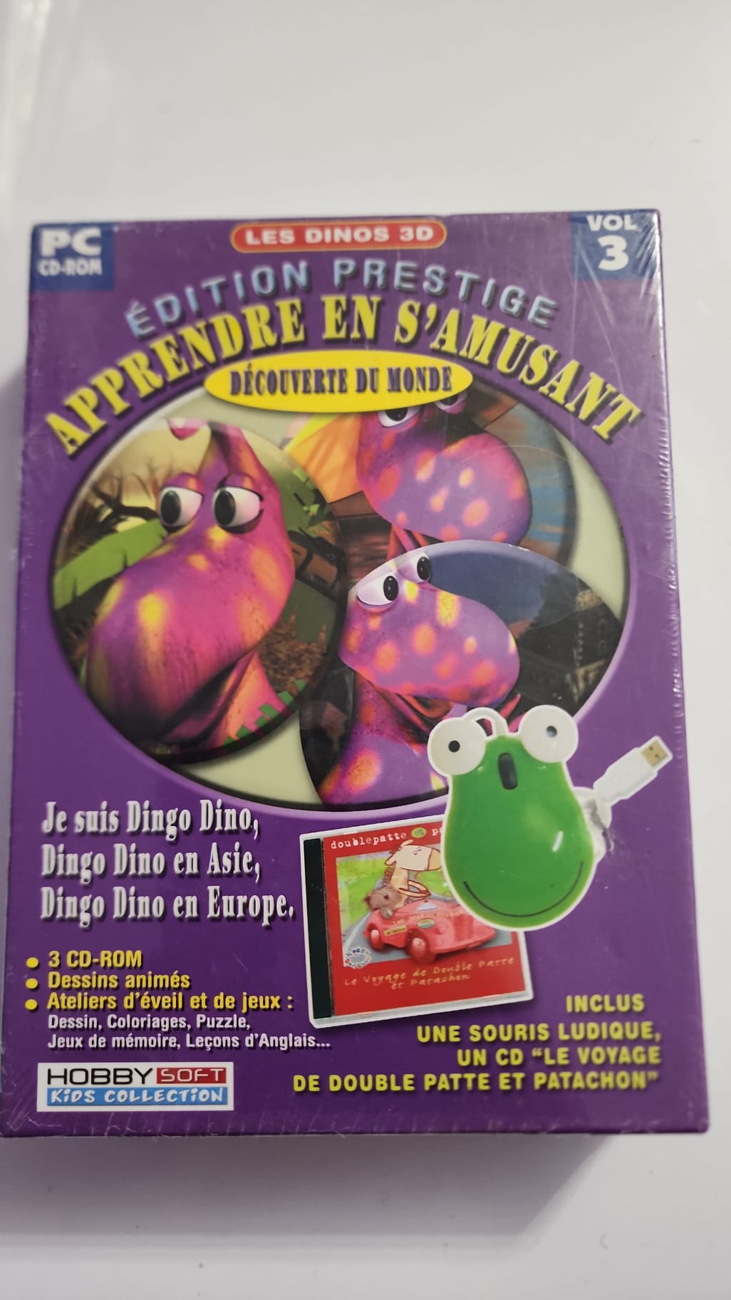 Dos du coffret Les Dinos 3D, trois CD-ROM PC, souris et CD audio annoncés