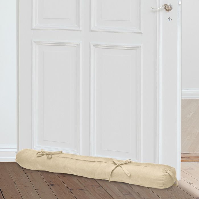 Boudin Beautissu Viento crème installé au pied d’une porte